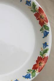 Check out our floral pattern dish selection for the very best in unique or custom, handmade pieces from our shops. 40s Vintage Harker China Hotoven Oven Proof Pottery Pie Plate Blue Red Ruffled Tulip Floral