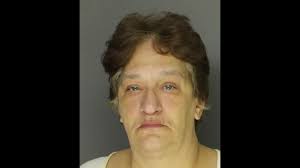 Woman, 58, arrested for beating pregnant teenager