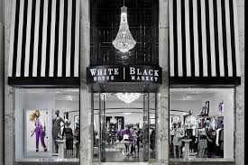 Storefront framed with black wood and cut out on white background. Brief Chico S White House Black Market Exiting Canada Polstar Announces First 3 Stores