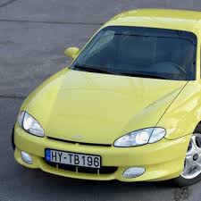 Image result for Pastel Yellow 2000 Tiburon