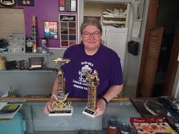 On the job with Kayleen Adams, owner of Midway Trophies in Elyria