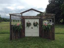 Rustic Barn Wood Wedding Doors Vintage Rent Flowers By Tammy 423 636 1000 Great Backdrop Or Aisl Barn Door Wedding Wedding Doors Wood Wedding Decorations