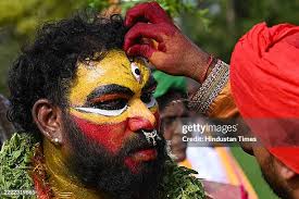 Devotees participating in the Ghatam procession during the Bonalu... News  Photo