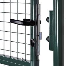 A Picture Of Opening Garden Gate With Dark Green Color