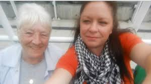 I'm looking for a special picture but for now please can you make me hug my  mum- I'm in red and she's in the middle