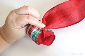 Learn the art of making a bow with two ribbons from professional wreathmaker and your favorite wreath making teacher, julie sciomacco. How To Make A Double Ribbon Bow For A Wreath Liz On Call