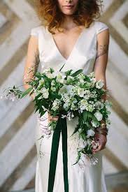 An emerald and gold table setting is extremely elegant, your. Emerald And Gold Bridal Inspiration 100 Layer Cake White Wedding Bouquets White Bouquet Wedding Flower Inspiration
