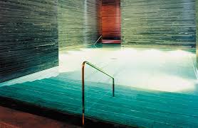 The massive presence of a singular type of stone and water. Hotel Therme Vals Yoga Aktuell