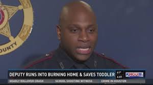 Deputy runs into burning home, saves toddler