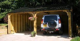 A safe and solid structure to house your car and so much more. Wooden Carports In Devon By Shields Garden Buildings