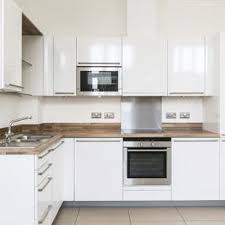 How To Repair Kitchen Cabinet Doors With Particleboard Swelling Hunker Refacing Kitchen Cabinets Laminate Cabinets Diy Kitchen Cabinets