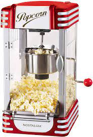 The old fashioned movie time popcorn maker is a modern machine with an appearance reminiscent of a bygone era when street vendors sold popcorn from carts. Amazon De Nostalgia Electrics Retro Kettle Popcorn Maker Popcornmaschine Popcorn Maiz Poppers 120 V 6 35 Kg