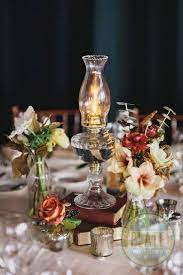 Weddings Completely Nice Post Number 7619630849 Simply Stunning And Elegant Wedding Arrangements Oil Lamp Centerpiece Wedding Centerpieces Book Centerpieces