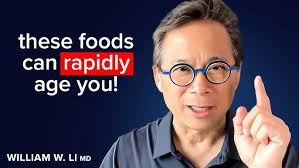 Dr. John Sanders with Derek Fairbanks and Eric Cheney