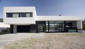 This modern farm house gives you 4 beds and 3.5 baths and has a bonus room with a full bath over the garage. Black And White Exterior Color Simple Modern House Design With Glass Window And Garage Building Yo Facade House Modern House Design House Architecture Design