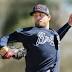 Kelly takes on relief duty after Braves' Snitker uses up pen