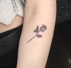 A Single Rose Tattoo Can Have So Much Versatility Ribcage Tattoo Small Rose Tattoo Tattoos