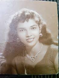 Taken in Empire cinema Staff Room about 1958.. my late sister Mary and two  operators can't recollect their names..