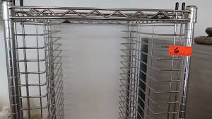 You would get the equivalent amount to 5in = ?ft then divide that by 67.5. Tall Wire Sheet Pan Rack W Caster Wheels 21 5 W X 26 D X 67 5 H Oahu Auctions