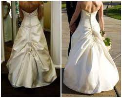 A wedding dress bustle is a way of pinning up the train onto the dress itself so it doesn't get stepped on or ruined. Austrian Bustle On A Wedding Gown Wedding Dress Bustle Petite Wedding Dress Seattle Wedding Dress