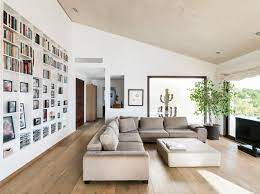 A living room says a lot about one's aesthetics. Concrete Home Combines Earth Tones With Minimalist Aesthetic