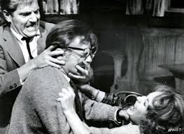 At the opening of the play, george is seen as martha's house boy — someone who will open the door, mix her a drink, listen to her tirades, and be her companion and her doormat. Who S Afraid Of Virginia Woolf 1966