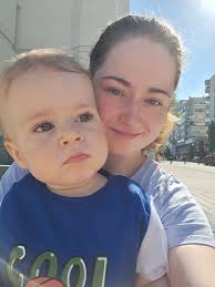 Can you edit a photo to make my son look happier?