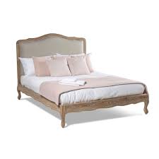 Dark brown fabric accents the center of the bed's headboard tufted details underscore the great look of the bed. Luxury Upholstered French Oak Bedroom Furniture Grosvenor Furniture