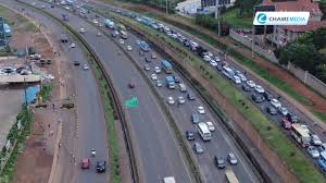 An aeriel overview of the thika super highway from ruiru to nairobi cbd and later lands at the wislon airport. Aerial View Of Thika Road As Motorists Rush To Beat Curfew Youtube