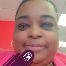 Who's the contact person for the building beside Kids Town?