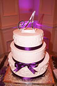 Simple Wedding Cake With Purple Accents Hayden And I Really Love This Cake We Are Torn Bet Simple Wedding Cake Wedding Cake Table Wedding Cakes With Cupcakes