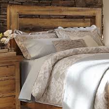 This bed arrives with a slat system and has center support legs, so you don't need to add a box spring under your choice of mattress. Willow Slat Headboard In Distressed Pine Bed Bath Beyond