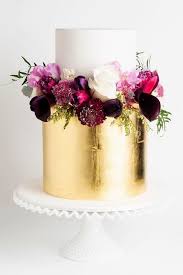 Place cookie cutters on the iced cake and sprinkle on sanding sugar. 57 Fascinating Gold Wedding Cakes Weddingomania