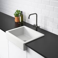 For a detailed look at kitchen island designs, countertop materials, dimensions, and additional features, check out our guide on buying a kitchen island. Havsen Apron Front Sink White Ikea