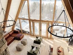 The New Cabin Chandeliers What S Working And What S Not Cabin Chandelier A Frame House House Fan