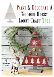 These diy outdoor christmas decorations will make it cheap and easy to get your porch and yard looking festive for the holidays! Decorating A Hobby Lobby Wooden Christmas Tree Cutout Organized Clutter