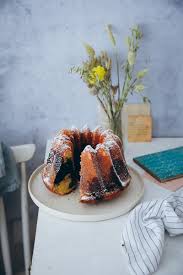 Bewertungen) mit alkohol, ergibt 20 küchlein oder einen großen gugelhupf. Orangen Marmorkuchen Gugelhupf Zucker Zimt Und Liebe