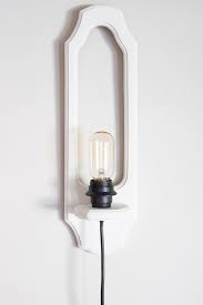 I just think they are lovely! Diy Upcycled Wall Sconces Swapitlikeitshot Erin Spain
