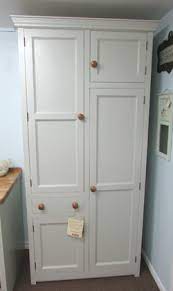 2 large storage areas behind both the upper and lower framed doors, featuring two fully. Freestanding Kitchen Larder Cupboard With Broom Cupboard Murdoch Troon