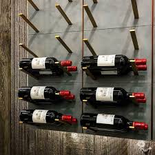 These modern metal peg wine racks are sold in ½ rods in a brushed aluminum, black or white finishes. Glass Enclosed Wine Cellars Stact Wine Racks