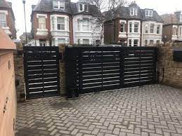 Discover our extensive range of wooden driveway gates from uk's largest bespoke gate manufacturer. Kingston Sliding Gate Gates And Fences Uk Sliding Gate Entrance Gates Driveway Sliding Gates