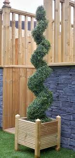 The lush evergreen spirals around to make an elegant design. Best Artificial Tm 5ft 150cm Boxwood Buxus Spiral Topiary Tree Uv Fade Protected Amazon De Garten