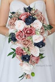 Blush pink and blue are opposite each other on the color wheel, which makes them complementary colors, the effect of the two together is timeless to help you get a perfect pink and navy wedding, i have collected several wonderful ideas, and let's start with these adorable wedding bouquets. Jojo Collection 202034 35 280 In 2021 Rose Bride Bouquets Navy Wedding Flowers Blue And Blush Wedding
