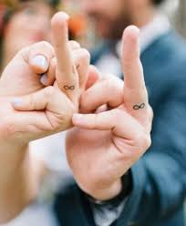 Maybe you would like to learn more about one of these? 27 Lovely Wedding Ring Tattoos To Make With Your Partner Tiny Tattoo Inc
