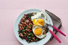 Keto Fried Eggs With Kale And Pork Recipe Diet Doctor In 2020 Quick Keto Meals Pork Recipes Fried Egg