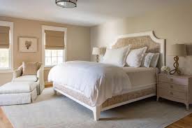 Neutral Coastal Bedroom With Seagrass Bed Frame Taupe Tones Create A Cohesive Classic Look In Coastal Bedrooms Coastal Bedroom Coastal Bedroom Decorating