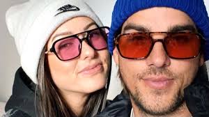 Noah Erb and Abigail Heringer say 'come play' in spooky matching costumes