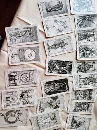 Tarot card reading is the practice of using tarot cards to gain insight into the past, present or future by formulating a question, then drawing and interpreting cards. Feline Tarot Cards Do You Recognize These Tarot