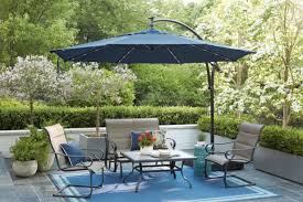 Crank and tilt patio umbrella in ruby. 8 Best Outdoor Patio Umbrellas In 2021 Cantilever Freestanding And More Hgtv