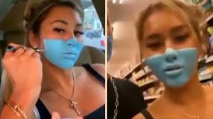 The clip then went viral on social media for the prank. Foreign Influencers Slammed For Painting Mask On Face To Enter Bali Supermarket Watch Video Offbeat News India Tv